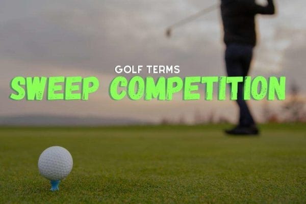 a golfer ready to hit a golf ball on the ground
